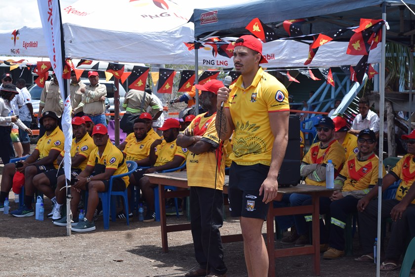 Robert Derby speaks to the crowd during a visit to a Bogi, Lealea Village.