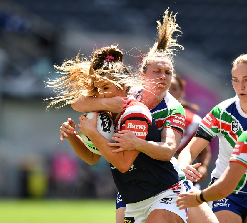Charlotte Caslick cops some heavy treatment against the Warriors.