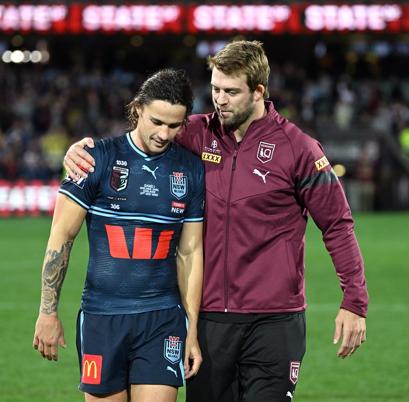 Christian Welch (right) embraces Nicho Hynes following NSW losing Origin I. ©NRL Photos