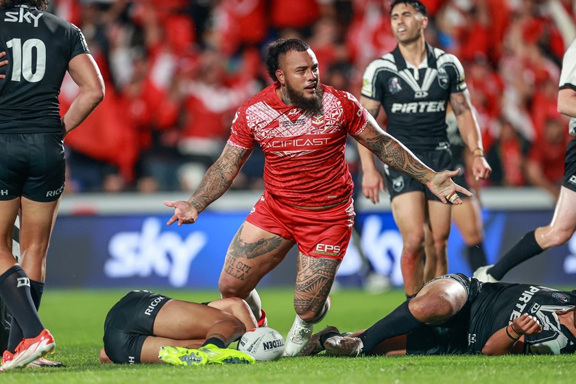 Addin Fonua-Blake leaves defenders in his wake as he powers over for a try against the Kiwis.
